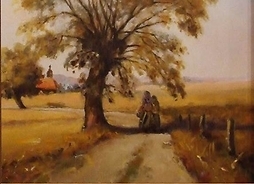 Na zdjęciu okładka, na której dominuje polna droga z ogromnym drzewem