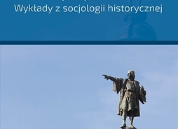 Okładka książki, na której uwidoczniono pomnik przedstawiający mężczyznę z uniesioną do góry jedną ręką